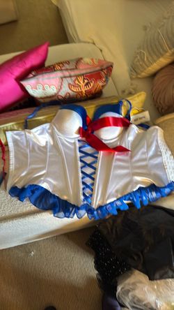 White Satin Corset with Blue Trim and Red Bow