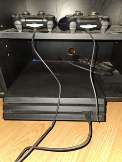 PS4 Pro 1TB w/8 games, 3 controllers