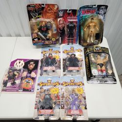 Lot Of 9 WWE Wrestling Figures 