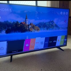 55” LG HDTV w/ 3 Tier Entertainment Center