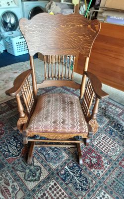 ANTIQUE ROCKER GLIDER CHAIR VERY OLD.  GOOD CONDITION FOR AGE. PU OFF OF 15&POWAY