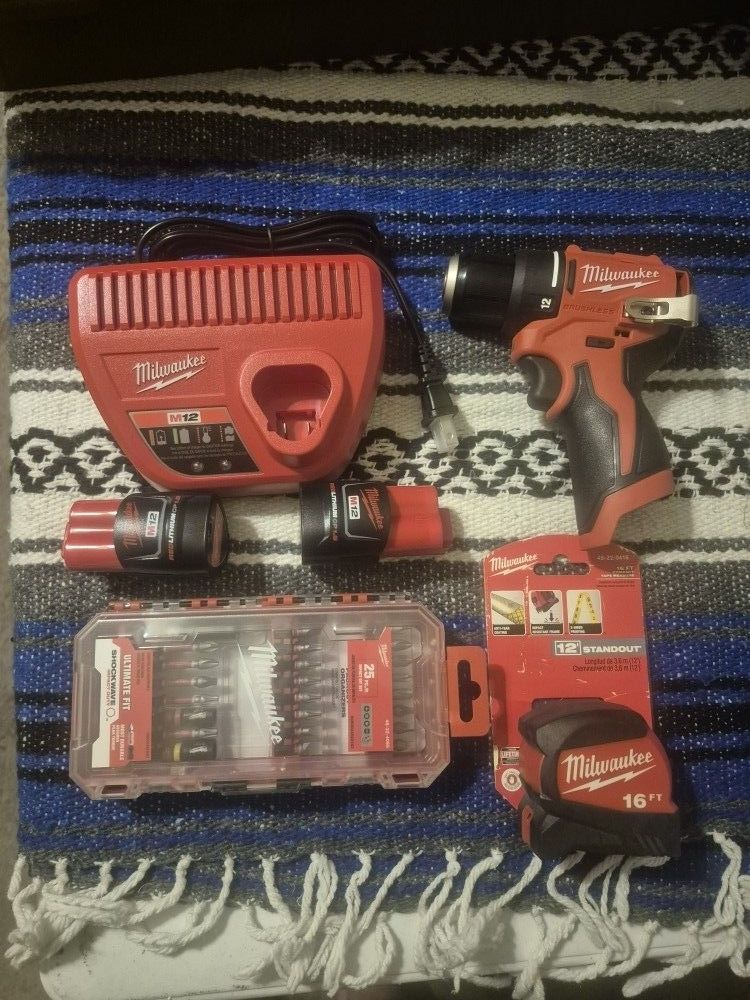 Milwaukee M12 Lithium-ion Subcompact Brushless 3/8 Drill Driver, Two 1.5ah Batteries And Charger + 16ft Tapeand 25pc Bit Set All New