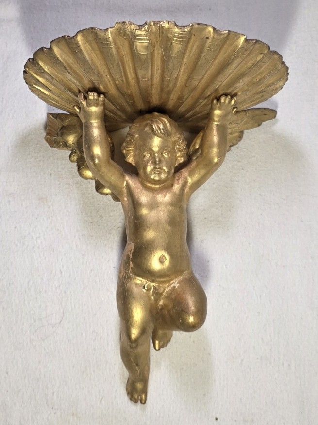 Small Shelf With Angel Holding It Up