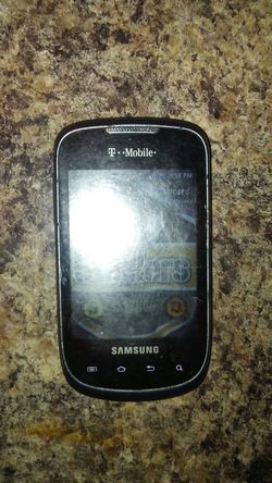 VINTAGE SAMSUNG CELL PHONE (T-MOBILE)$25.00 OBO.