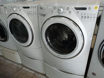 Whirlpool Duet front load washer and dryer set on pedestals - Free delivery