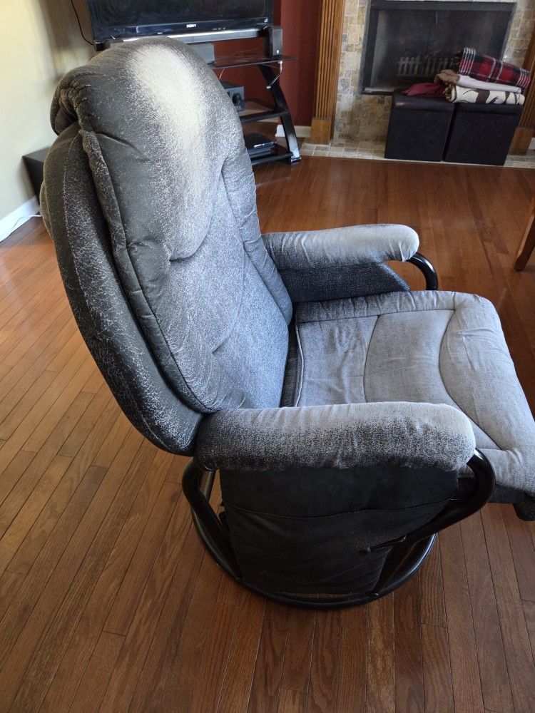 Black swivel padded rocking gliding chair