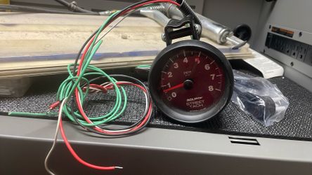 Auto meter tach 4”