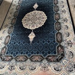 Two  Persian Carpets 