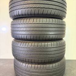 V718  235 65 18 106H  Michelin  Primacy Tour A/S  4 Used Tires 80% Life 