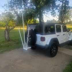 Hitch flagpole holders.
