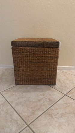 Wicker coffee table/seat with storage.