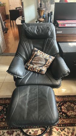 Very comfortable reclining leather chair with ottoman footstool