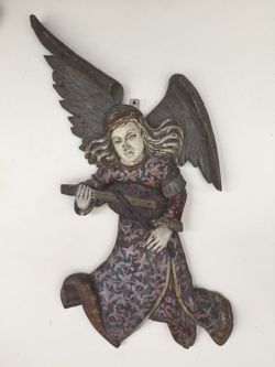 Wood carving drunken angel