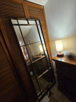 Tall mirror about 8 ft tall or taller and about 3 ft wide