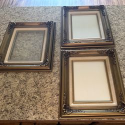 🖼️ Vintage Antique Gold Set of 3 Matching Wood Baroque Style Picture Frames with a 1” linen fabric matte around the frame.  Each Measures: 16”Hx14”Lx
