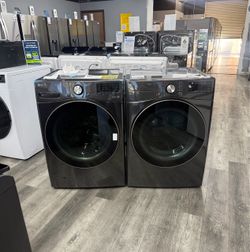 LG 4.5 Cu Ft Stackable Front Load Washer With Steam & 7.4 Cu Ft Stackable Gas Dryer Laundry Pair - Black Steel 🔥