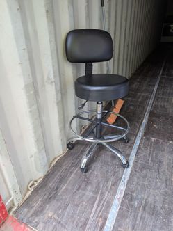Black chairs on rollers