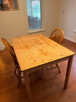 IKEA solid wood table with 2 chairs