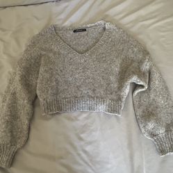 Grey knitted sweater