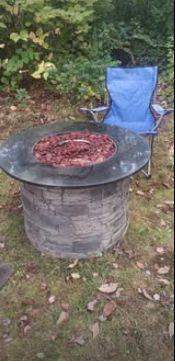 36 x 24 Round propane granite top fire pit with fairly new tank 75% full