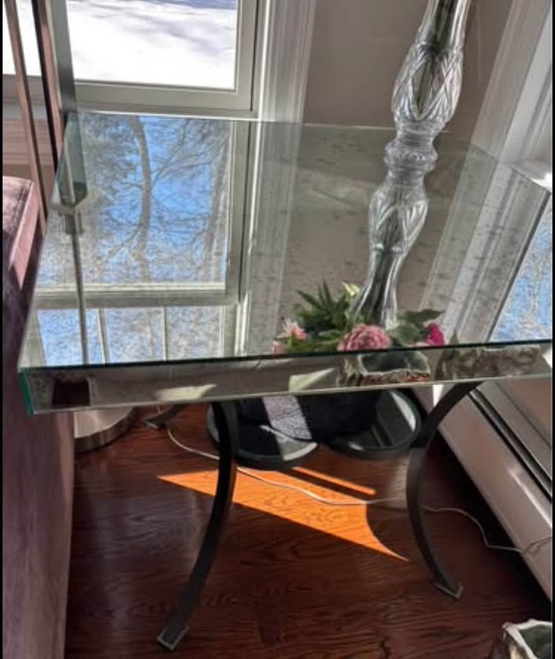 Contemporary silver mirror table, 35x35” and 30” height.
