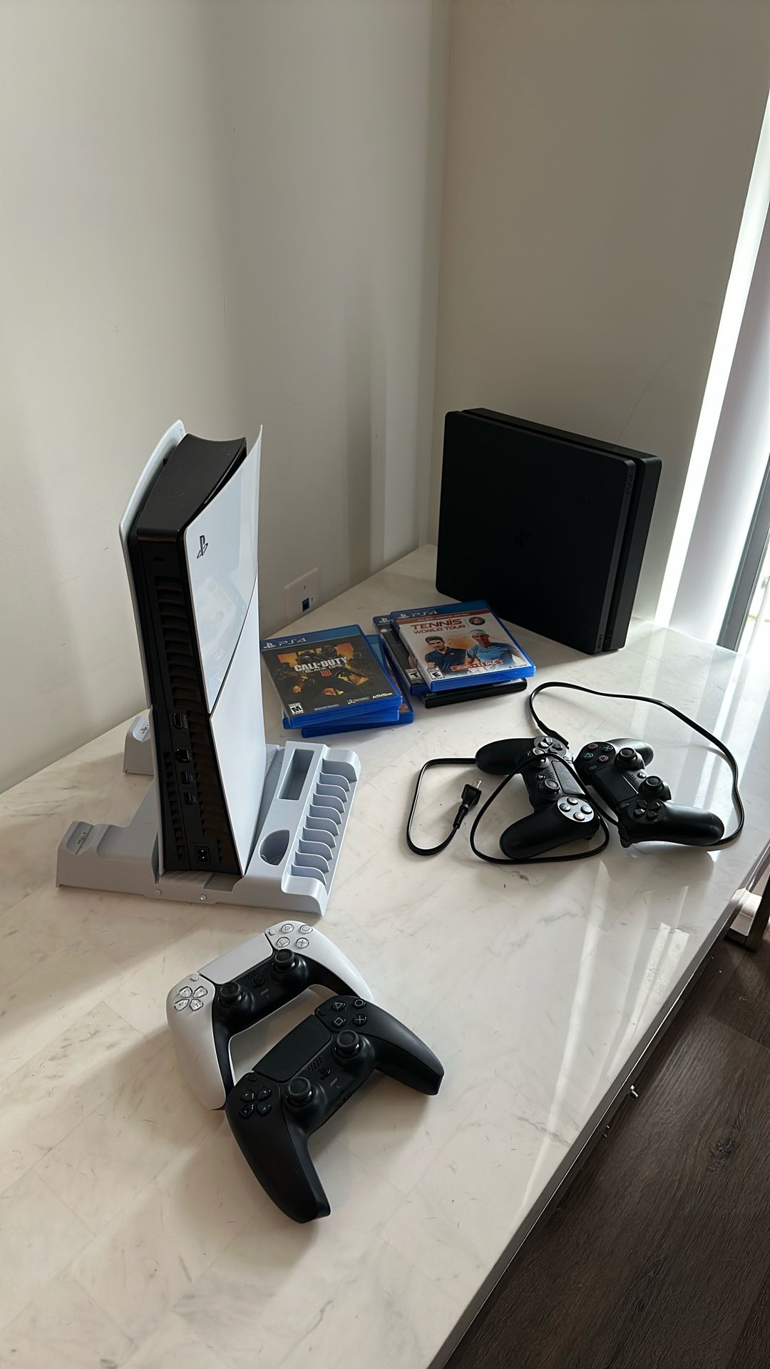 PS4 + 2 Controllers + Ps5 +2 Controllers And 6 Games