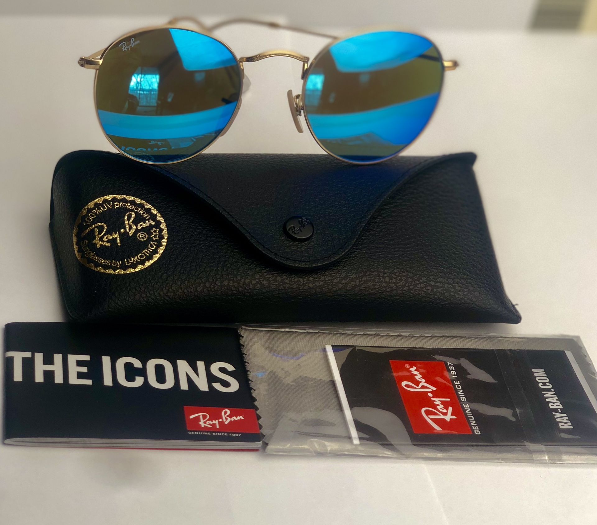 Ray Ban sunglasses rb3447 001 round metal 50-21, Gold Frame/ Mirror Blue Lens.
