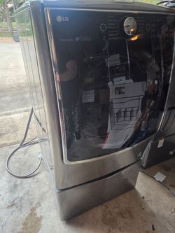 Top of the line LG Washer/Dryer Set with Pedestal Sidekick Washer