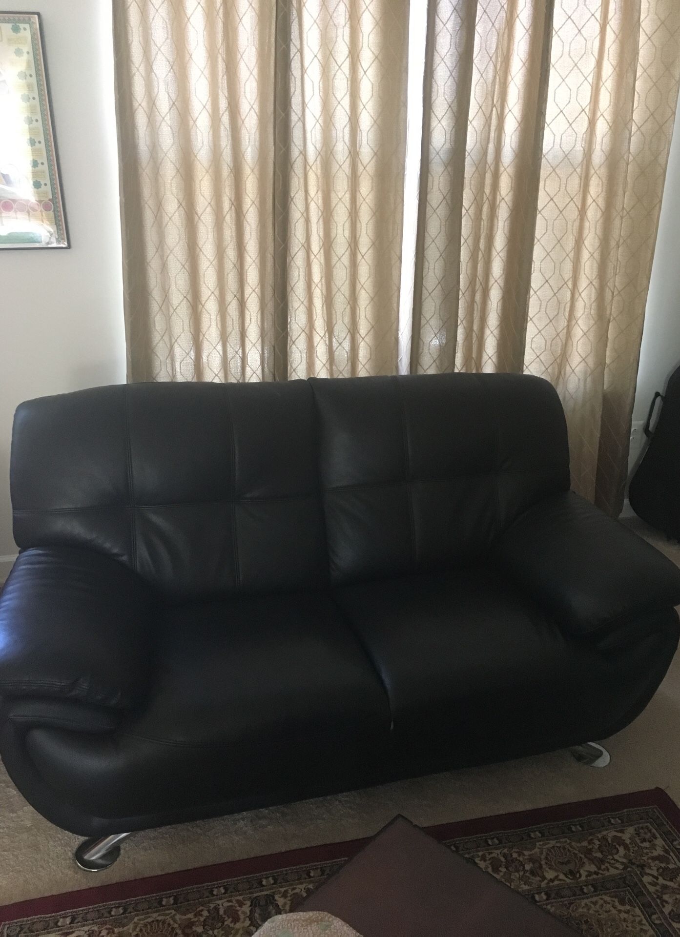 Leather living room set with love seat, sofa, and single chair