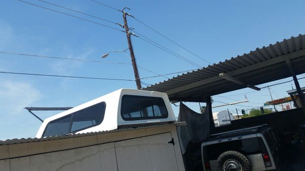 2008 Nissan Titan camper shell rear glass missing for Sale in Phoenix