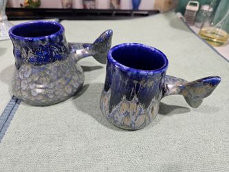 2 vintage Doug Wylie mugs