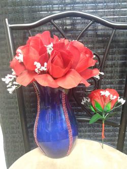 $40 very beautiful Mother's Day flowers/ baby breaths red rhinestones on blue vase/boutonniere. (2) Red candles + (2) candle holders. Solon, Ohio