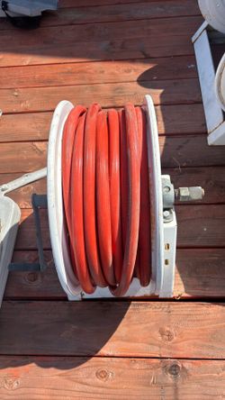 Two Cox reels, one electric and one hand driven