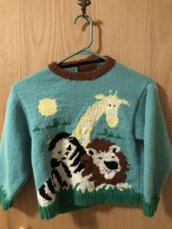 Beautiful handmade knitted boys or girls sweater