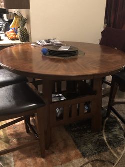 Beautiful walnut all wood table with 4chairs. 54 By 3ft...Price Is Firm