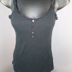 Old navy small black tank Top
55% cotton, 37% polyester and 8% spandex

