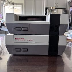 Old Nintendo Console With Games  