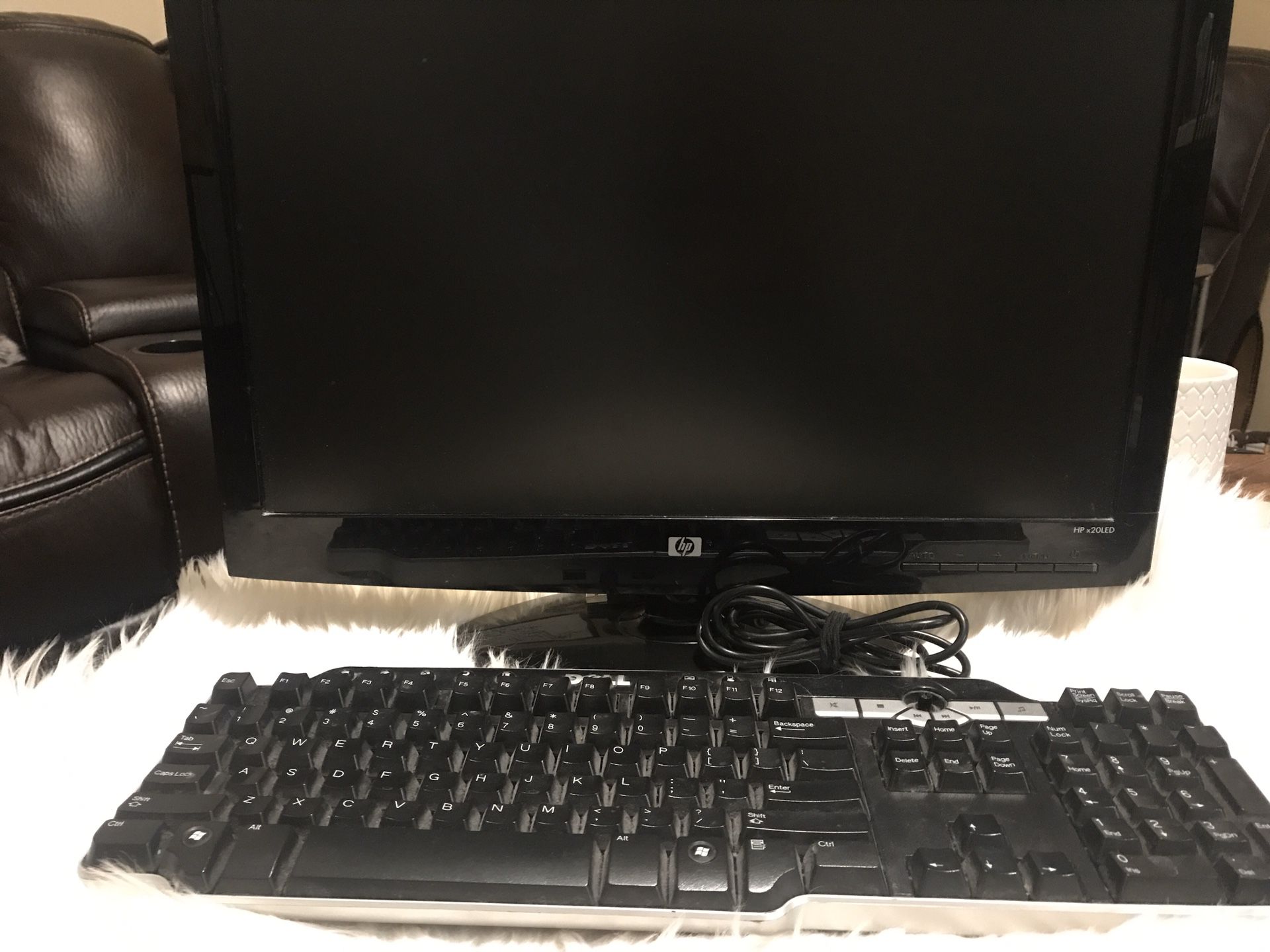 19 inch flat screen computer monitor and keyboard
