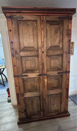 Rustic Wood Armoire with Iron Hardware