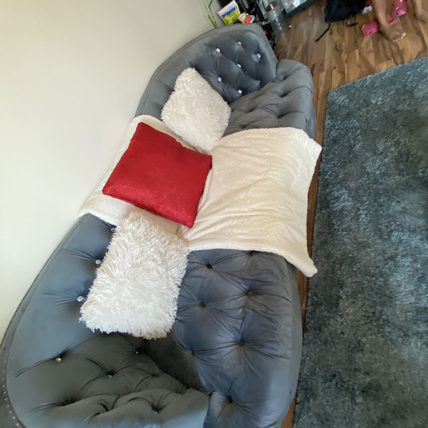 Brand New Blue Couch With Pillow And Small Black & Red Table 