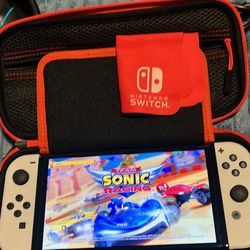 NINTENDO SWITCH OLED WITH DOCKING STATION, EXTRA CONTROLLER, MEMORY CARD, TEAM SONIC RACING