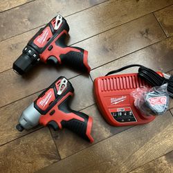 Milwaukee Impact Driver, Drill, Battery And Charger 