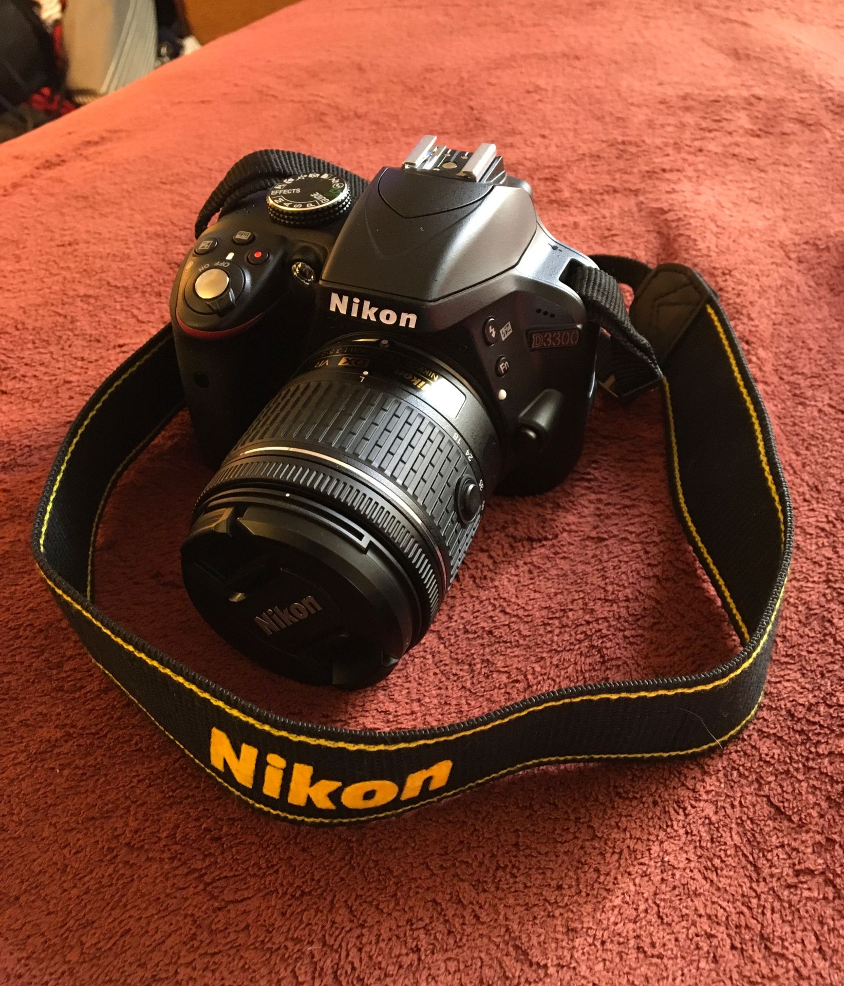 Nikon D3200 HDSLR camera, telephoto and wide angle lenses included, 24.2 megapixel DX format with collapsible 18-55mm lens, and complete kit, $355