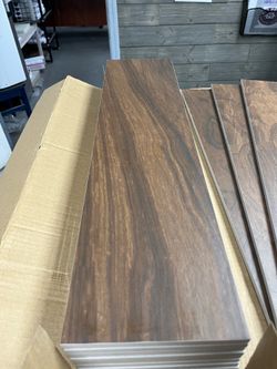 Porcelain plank tile 6x24 brown $.79 cents a square foot