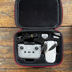 DJI Mini 2 SE 4k Camera Drone (with RC-N1 Remote) with 2 batteries and caseDJI Mini