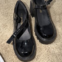 Zapatos de charol