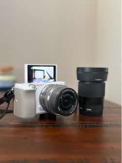 sony a6100 and sigma 30mm f1.4 lens as well as streaming essentials