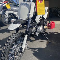 **Brand New Dirt Bike 125cc** - Adult size. - Kick Start. - Manual with Clutch. - 4 gears. - Mph 55-60 - Support up 450 lbs. - Alloy rims and suspensi