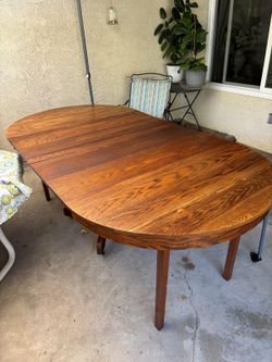 Antique solid wood table expandable; ca. 1920