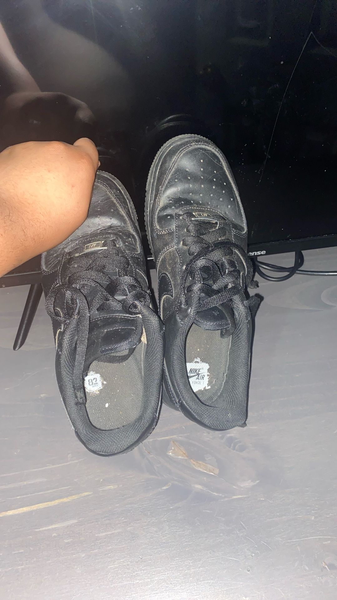 Black Air Force 1s.